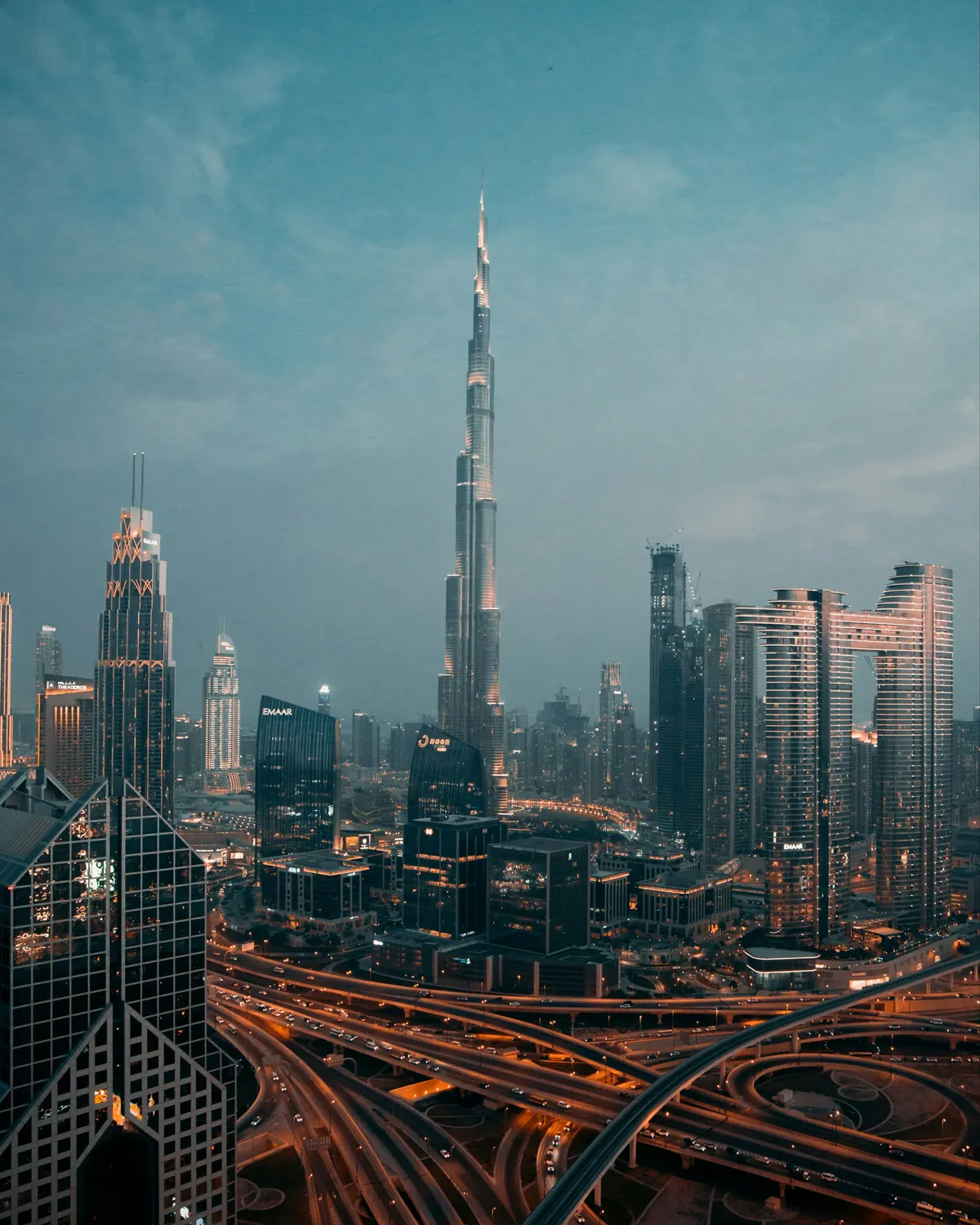 Burj Khalifa and the towers of Downtown Dubai above a web of highways